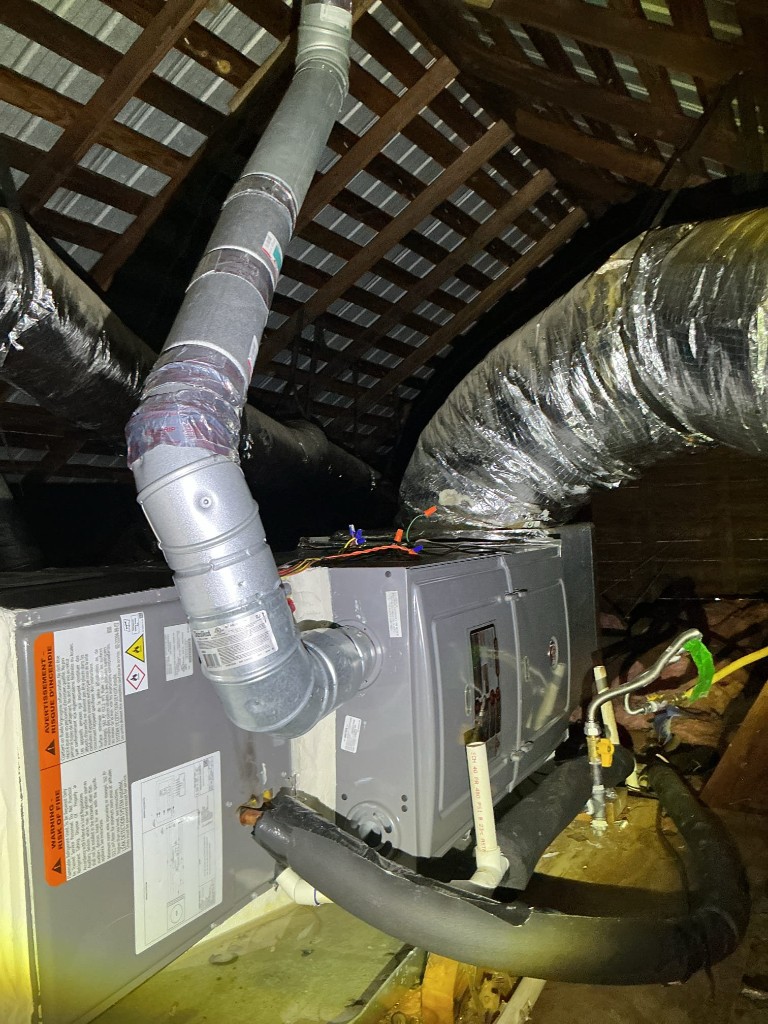 Rheem HVAC equipment in attic in ZIP 78641